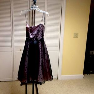 Polka dot in black with light pink lining.Size 11-12